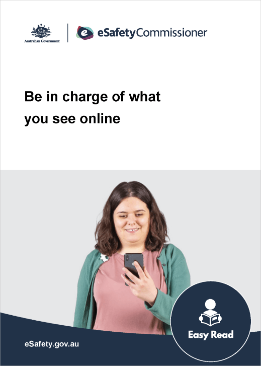 Young smiling women looking at a hand held device